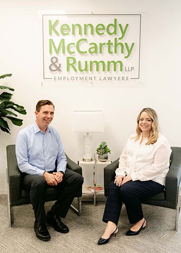 james and colleen with interior office sign